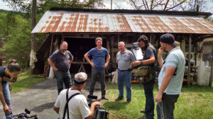 The History Channel filmed an episode of American Pickers in Little Falls May 11. Above, from left, are the show's stars Frank Fritz and Mike Wolfe with Herkimer County Sheriff Chris Farber